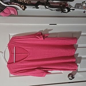 Brand new but no tag. It's a gorgeous pink/ coral.